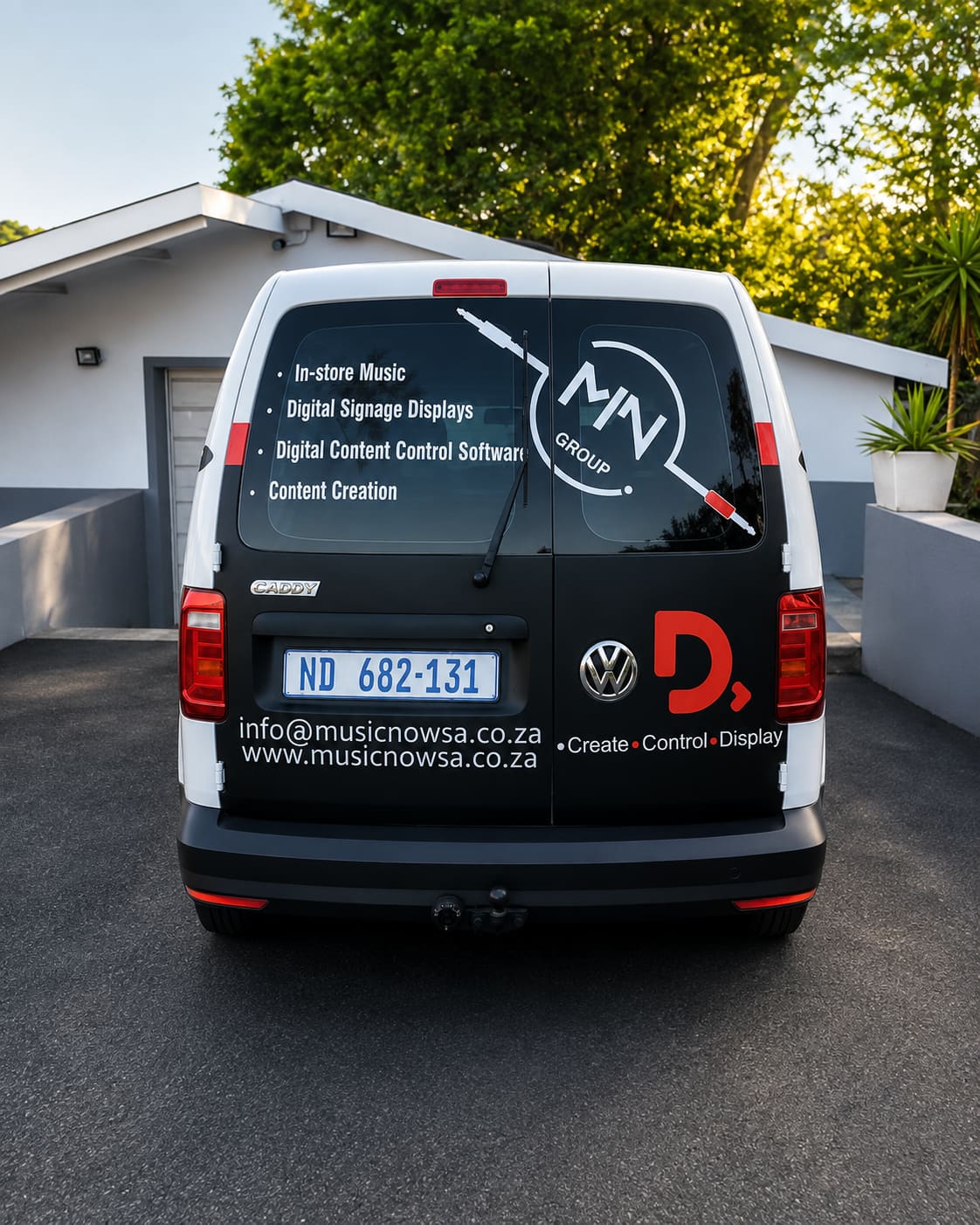 Volkswagen Caddy with a Music Now / MN Group vehicle wrap